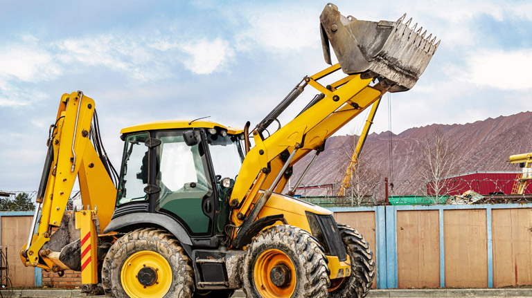 yellow backhoe