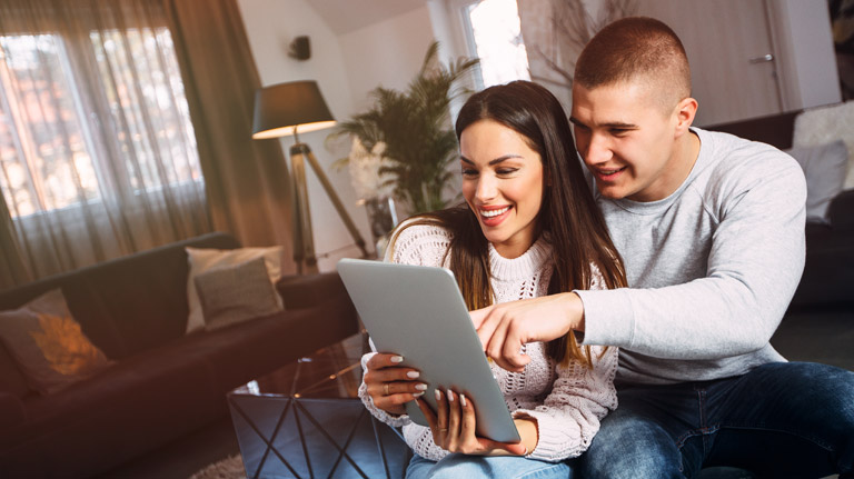 couple on their tablet