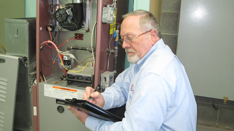 propane technician preforming service