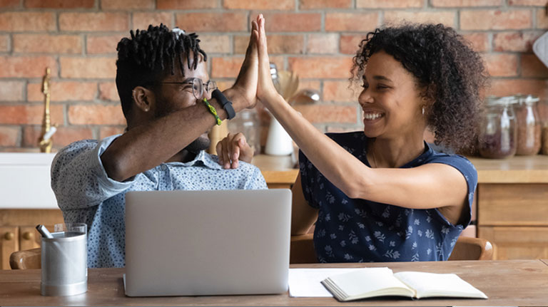 couple high fiving